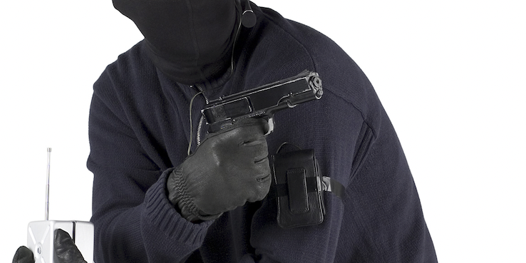 terrorist-with-bomb-detonator-and-handgun 2