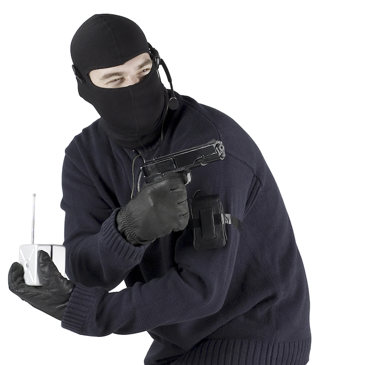 terrorist-with-bomb-detonator-and-handgun 2